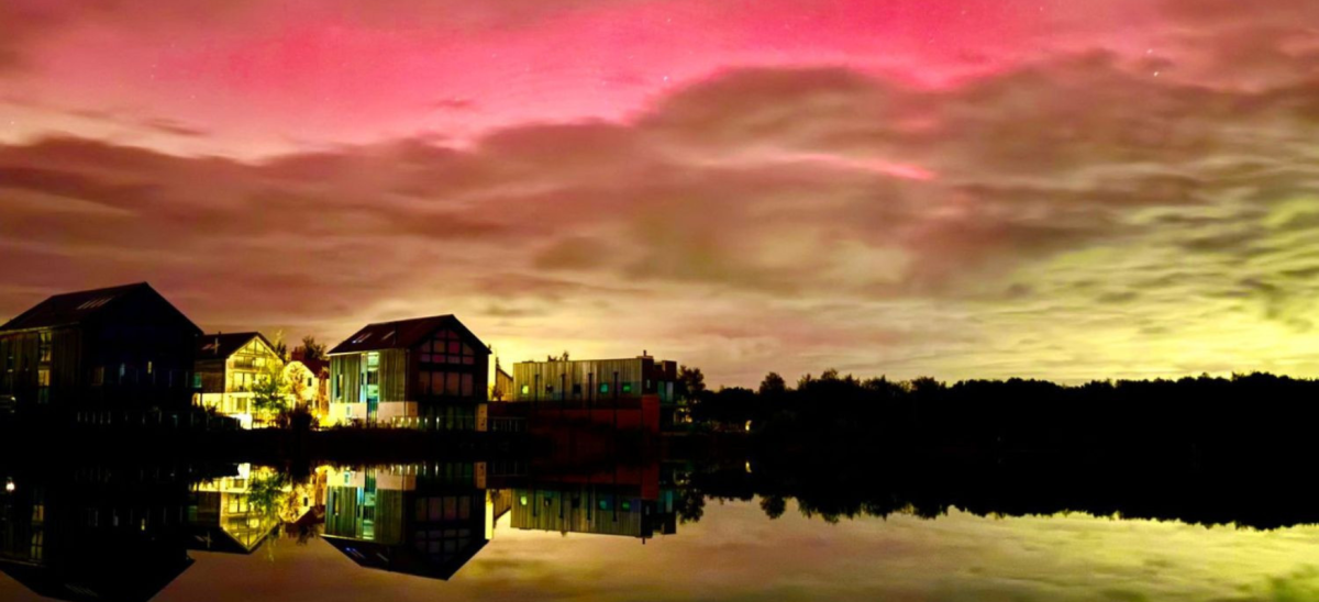 Aurora and cloudy skies over Silverlake lakeside accommodation