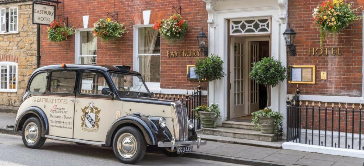 Exterior view and classic car outside The Eastbury Hotel & Spa at Sherborne, Dorset