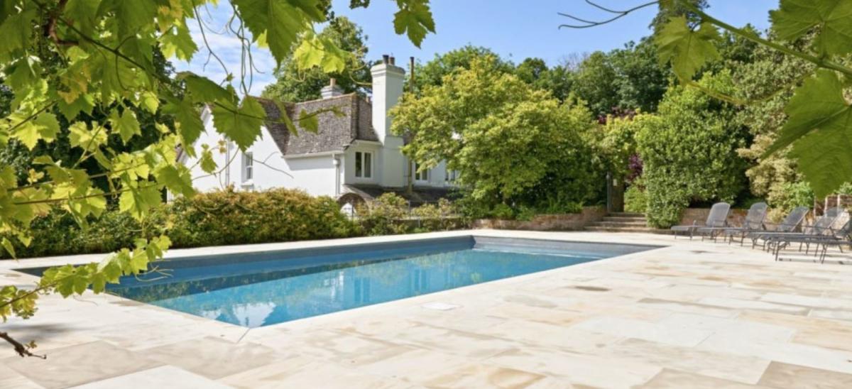 Outdoor swimming pool at The Lindens - Lulworth Holiday Cottages in Dorset