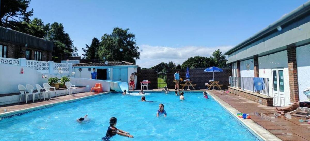 Outdoor swimming pool at Newlands Holiday Park, Dorset
