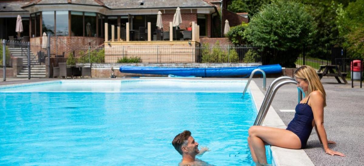 Outdoor swimming pool at Osmington Lodge Park, Dorset