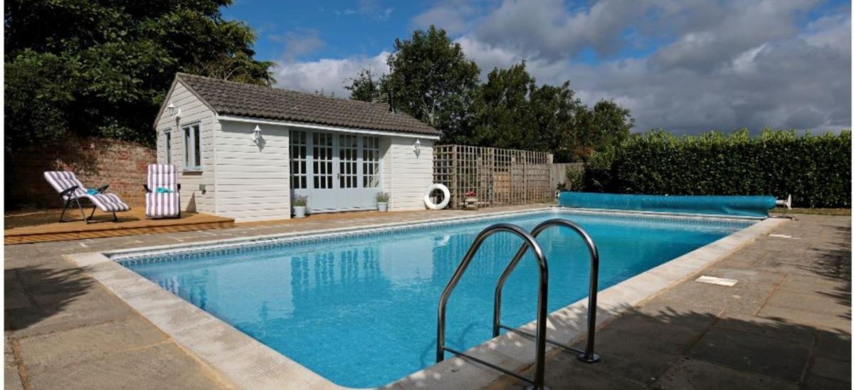 Outdoor swimming pool at Stable Cottage near Dorchester, Dorset