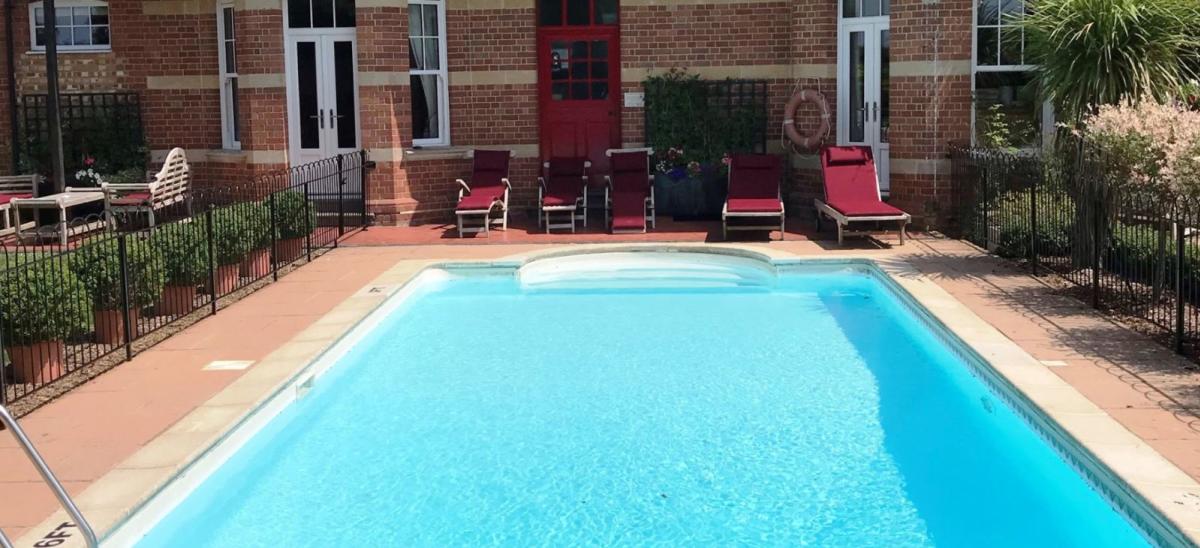 Outdoor swimming pool at The Dower House Hotel, Lyme Regis in Dorset