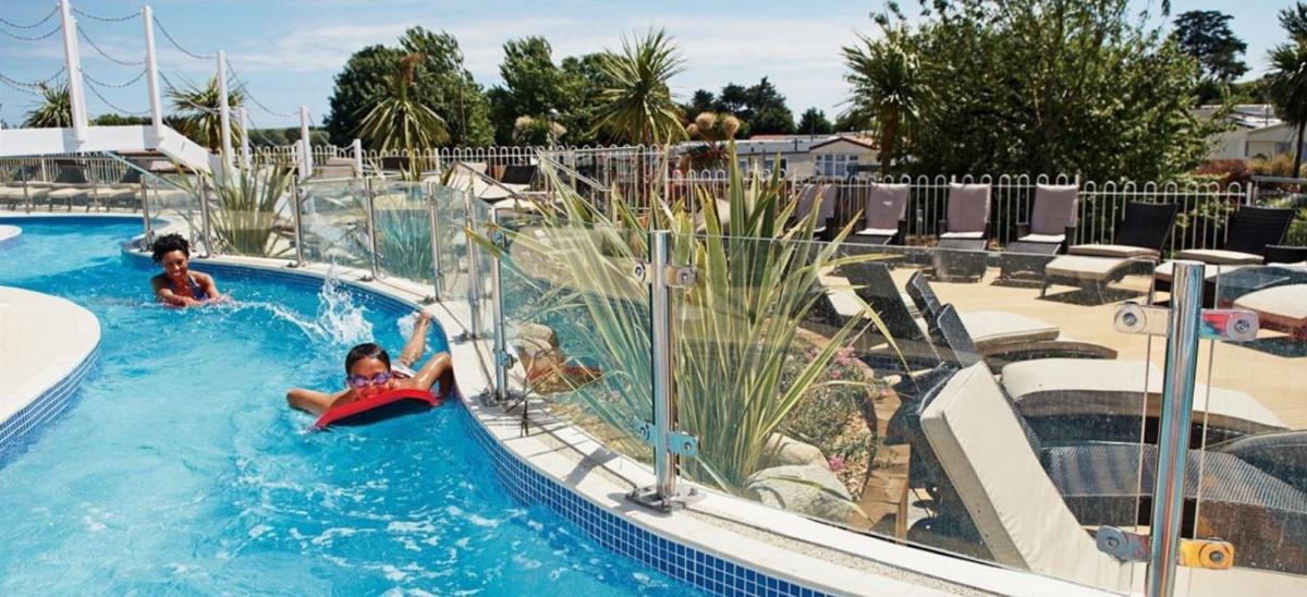 Outdoor swimming pool and Lazy River at Weymouth Bay Holiday Park, Dorset