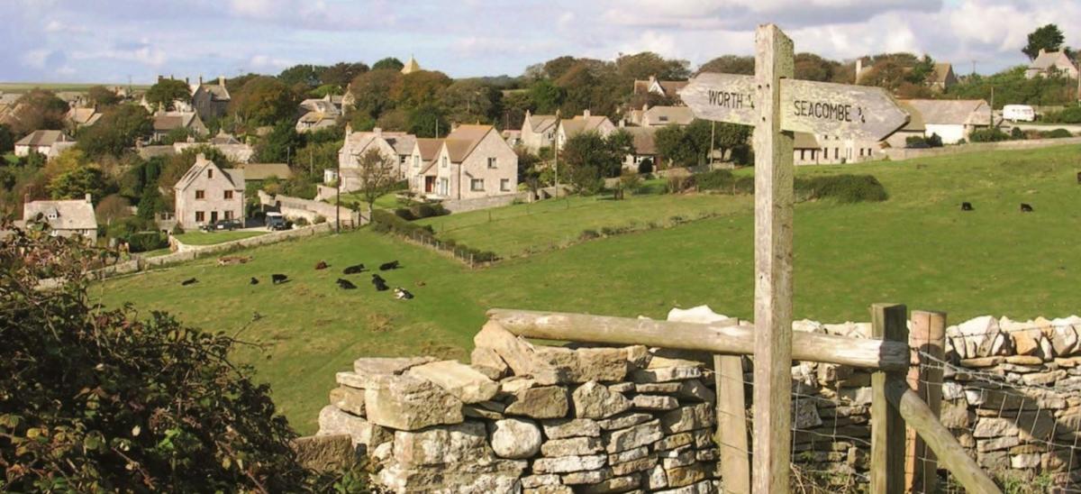 Views of Worth Matravers village from the Smugglers Ways walking route in Dorset