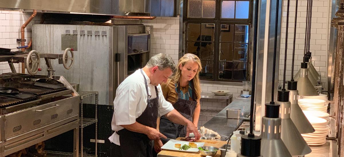 Chef John Murcko and Host Locke Huhges in the kitchen