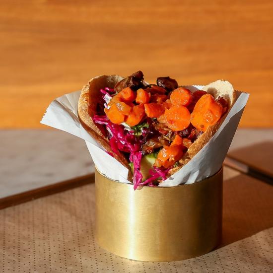 Brassica Pita in a gold serving dish.