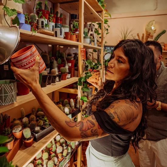 A woman shopping at The Brass Hand