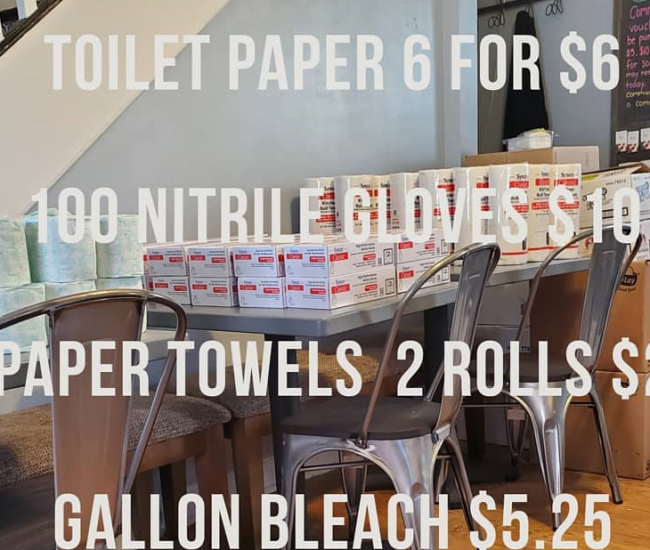 stacks of toilet paper, bleach and boxes