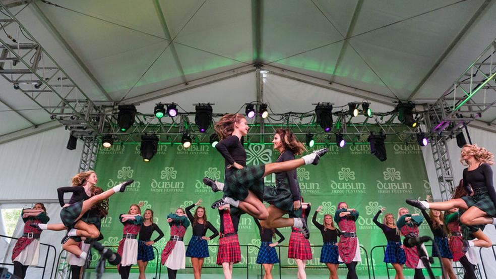 Irish Dancers mid-air performing at the Dublin Irish Festival