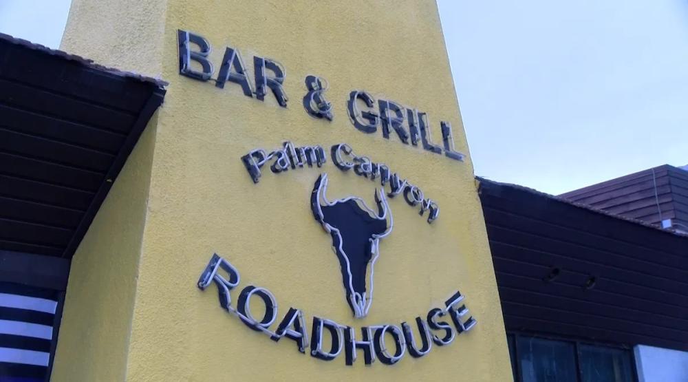 Exterior sign at Palm Canyon Roadhouse in Palm Springs