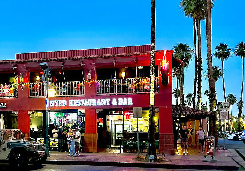 Exterior at dusk of N:YPD Restaurant and Bar in Palm Springs