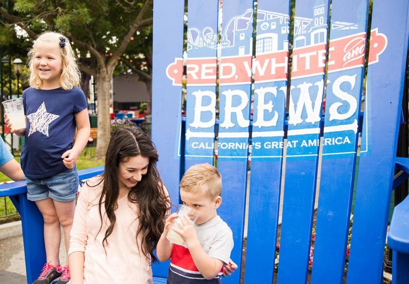 Family drinking lemonade at the Red, White & Brews Festival at California's Great America