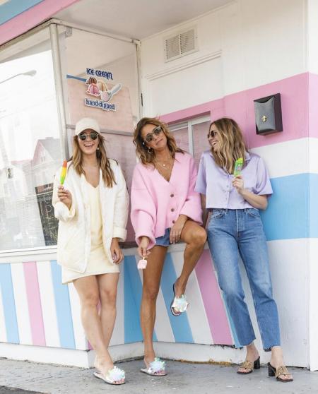 Three girls pose in Ladybird summer fashions