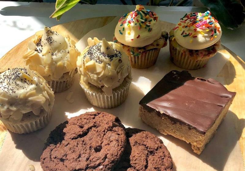 An assortment of cupcakes, cookies, and dessert bars from The Owlery