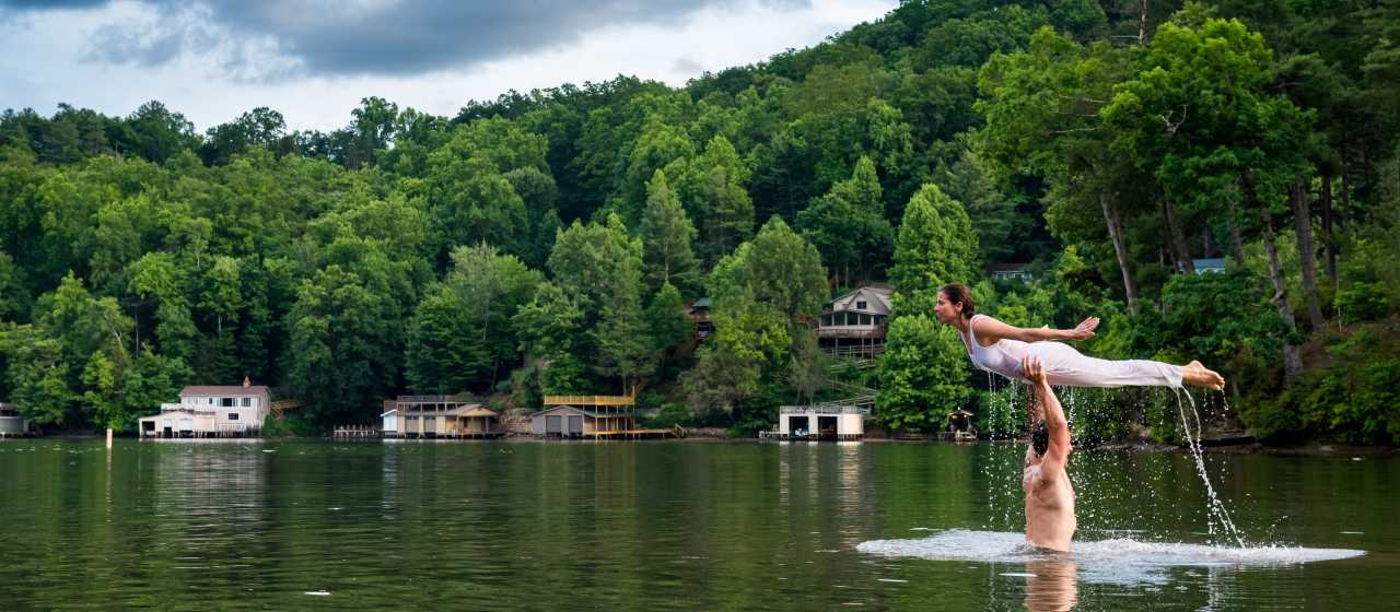 Man and women recreating a Dirty Dancing scene in Lake Lure, NC}