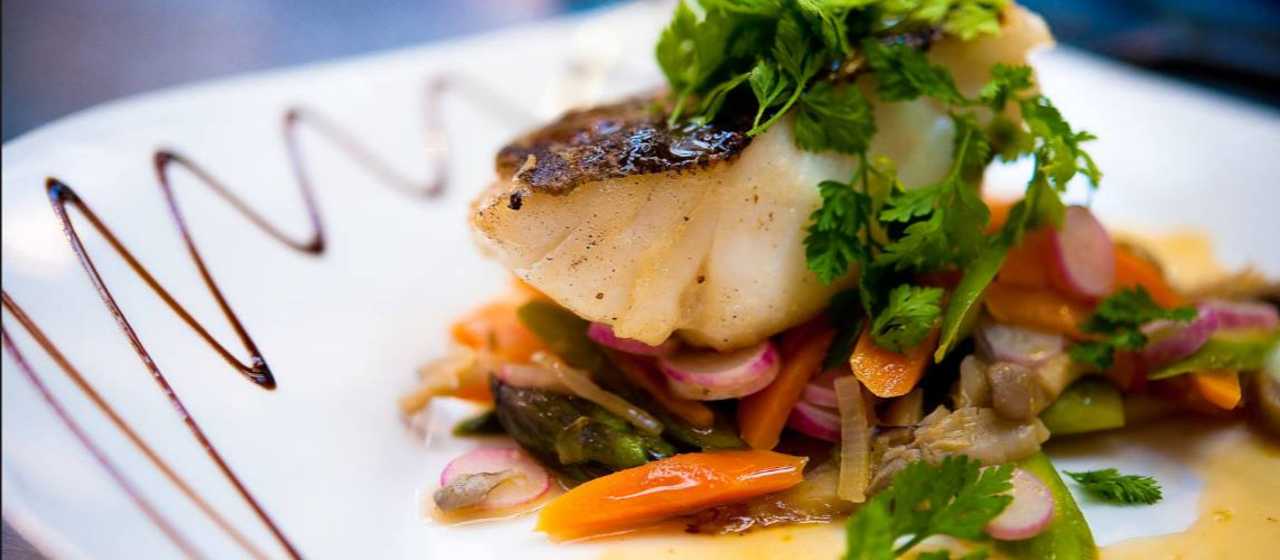A gourmet meal featuring North Carolina Trout, served at the Lodge on Lake Lure.}