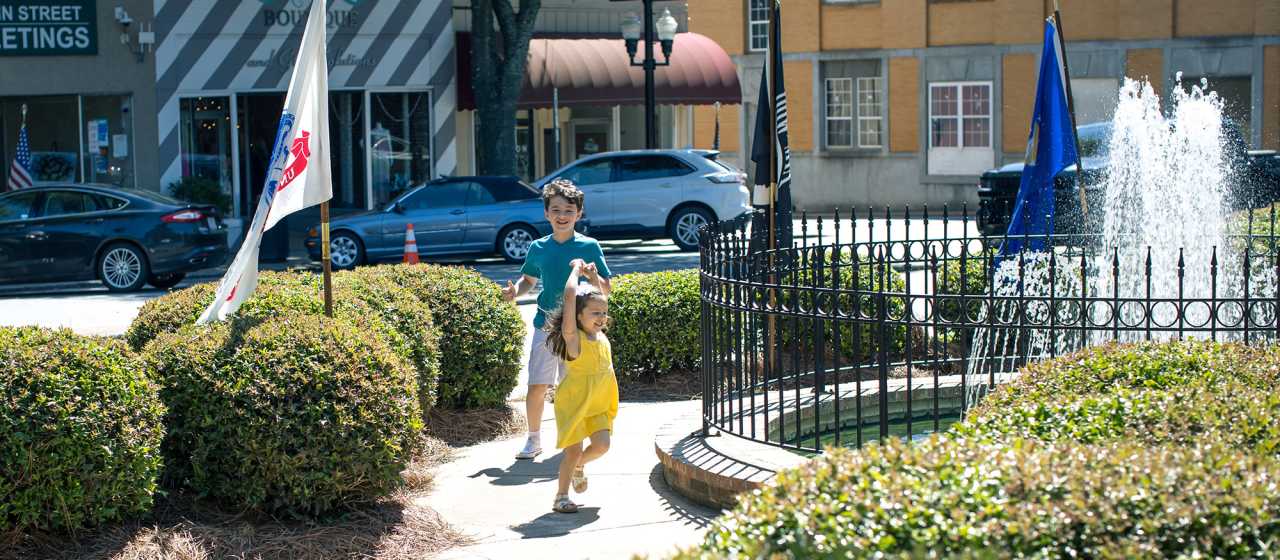 Children running in Small Carolina Town}