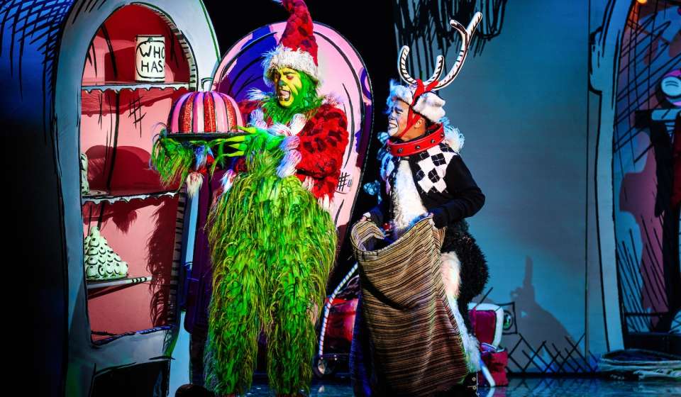 James Schultz as THE GRINCH and Xavier McKnight as Young Max in the Touring Company of Dr. Seuss’ HOW THE GRINCH STOLE CHRISTMAS! The Musical