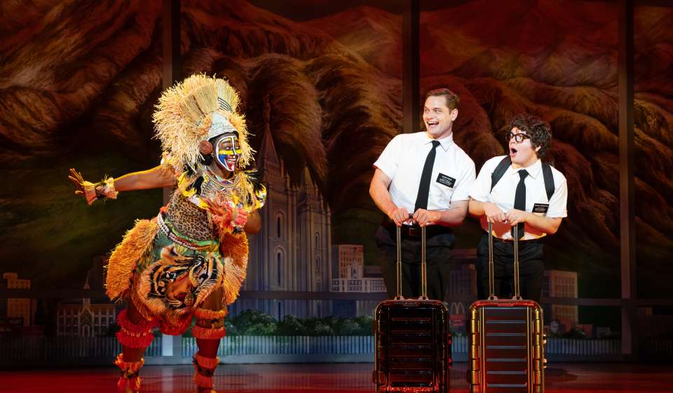 Jewell Noel, Sam McLellan, and Diego Enrico in THE BOOK OF MORMON North American tour