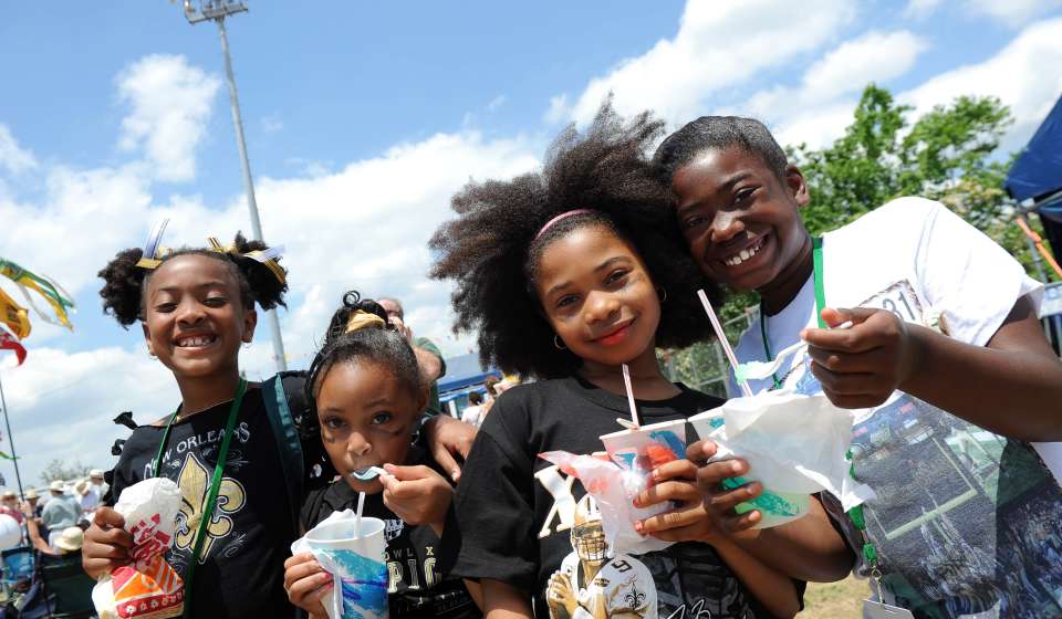 Kids Enjoying Sno-Balls at Jazz Fest