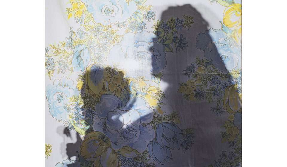 Letitia Huckaby, Detail of Ms. Angela and the Baby, 2022, pigment print on fabric with embroidery.