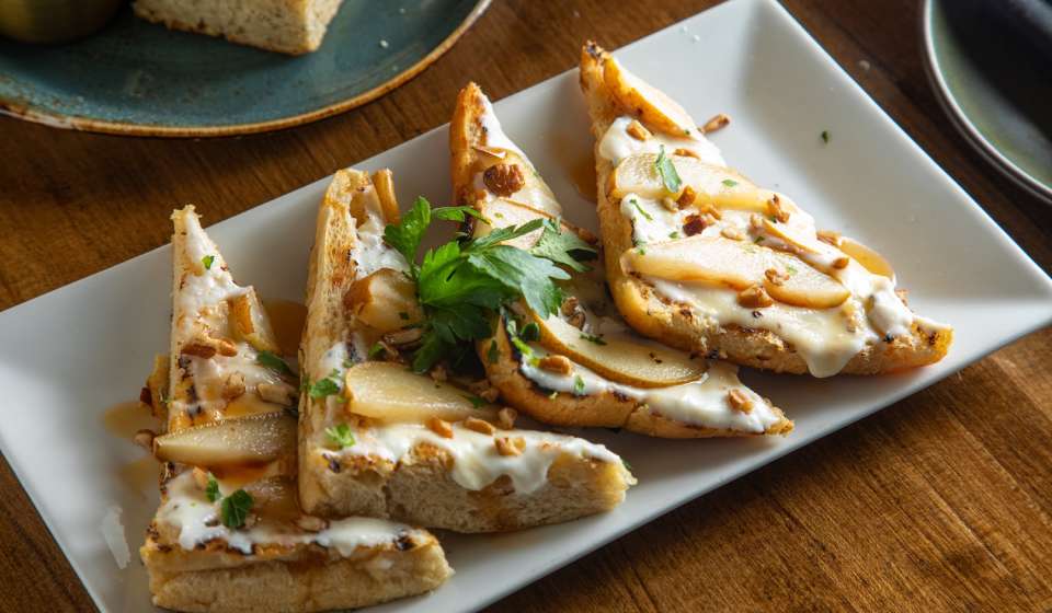 Beggar's Banquet - Pear Toast with sweet ricotta, roasted pears, hot honey and pecans