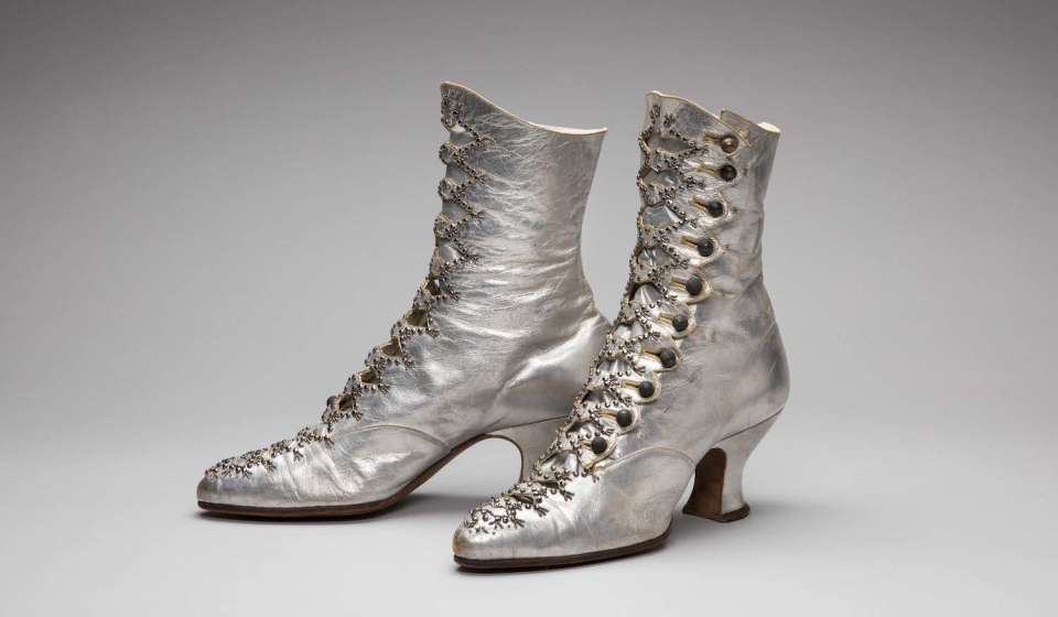 "Fashioning America: Grit to Glamour" - Sorosis Trademark Luxuries for A.E. Little Co., Boots, 1890s. Leather and metal. Jimmy Ray Collection, Salem, MA.