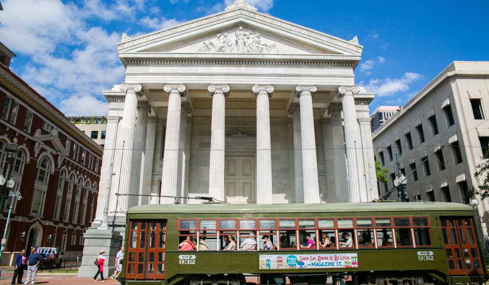 A Streetcar Passes in front of Gallier Hall