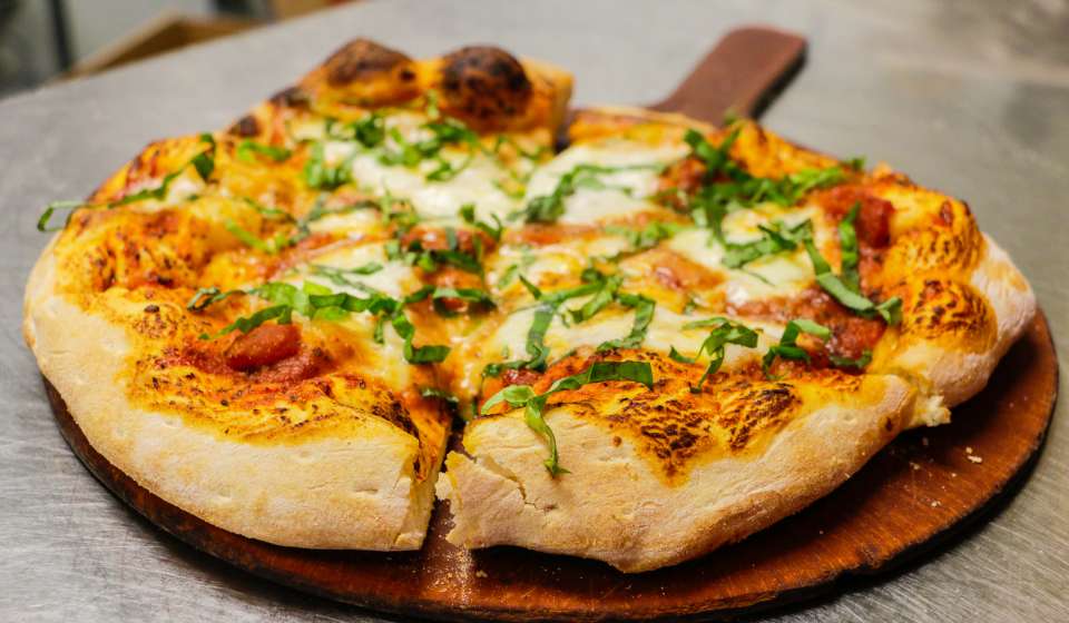 Make a Reginelli’s pizza at home