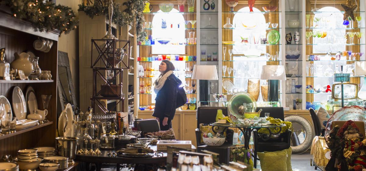 A person browsing through locally-made goods at Perppercorn on Pearl Street in Boulder.