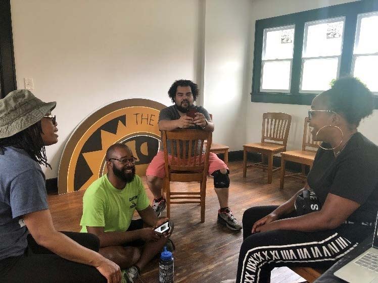 Black Owned Businesses Leaders Sitting In A Meeting