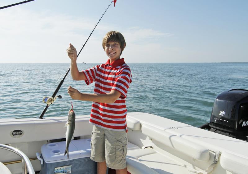 Fishing Boy with Fish