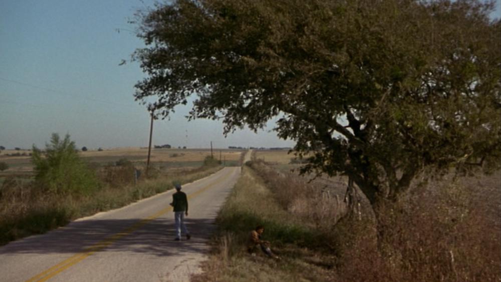 What's Eating Gilbert Grape Screengrab showing Arnie running down a Country Road