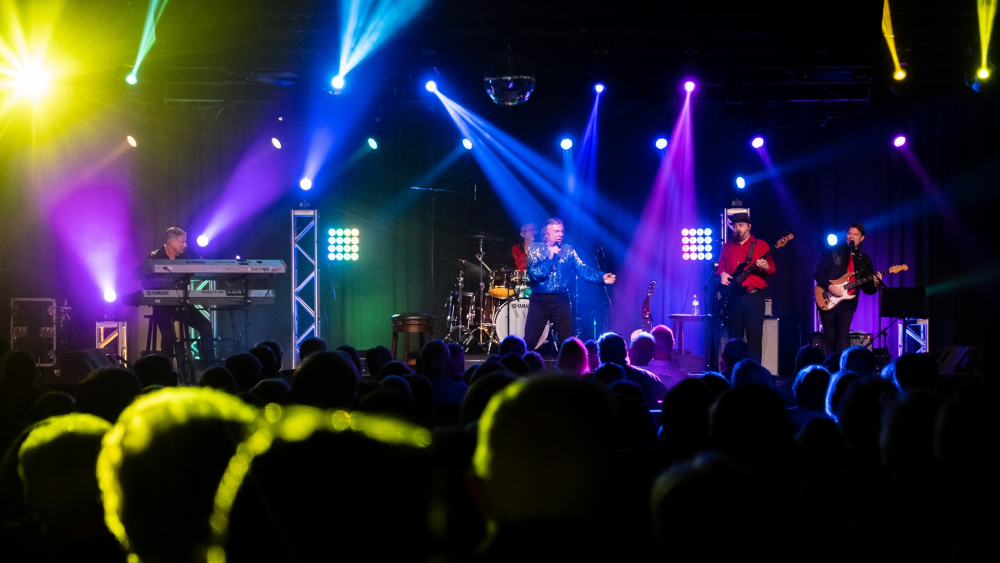 Performers on stage at the Belfry