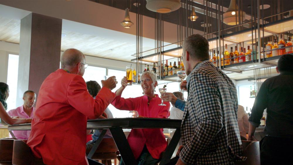 Group of people at the 4 Saints Restaurant in the Kimpton Rowan Hotel