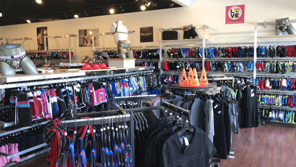 clothes on racks at gaymart