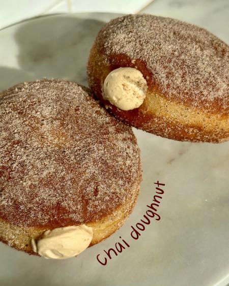 A close-up image of a chai doughnut at The Station On Kings.