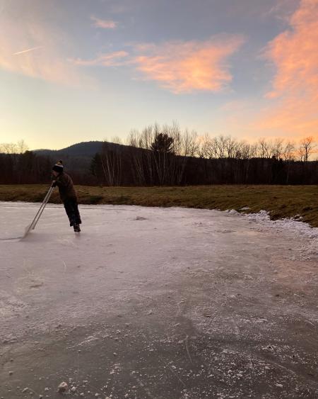 Franconia Inn February Vacation Promo Image - Kid Ice Skating on Pond