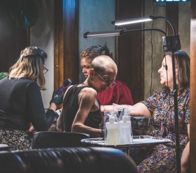 Wedding guests getting tattooed