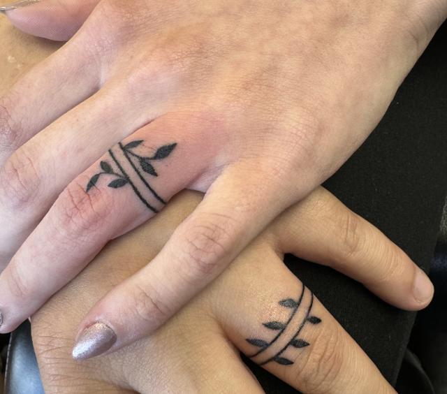 Matching ring tattoos