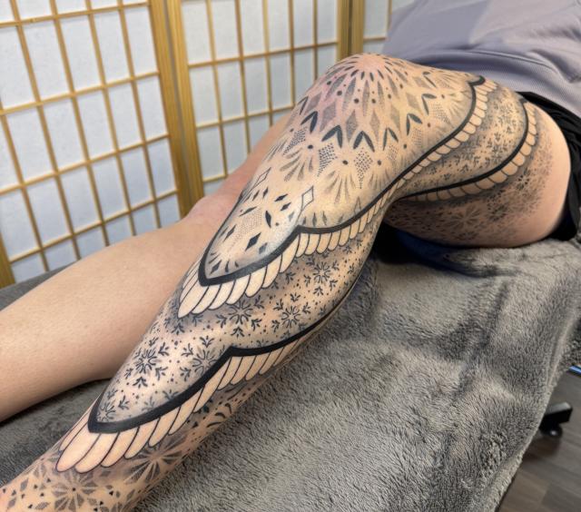 Beautiful feminine leg tattoo