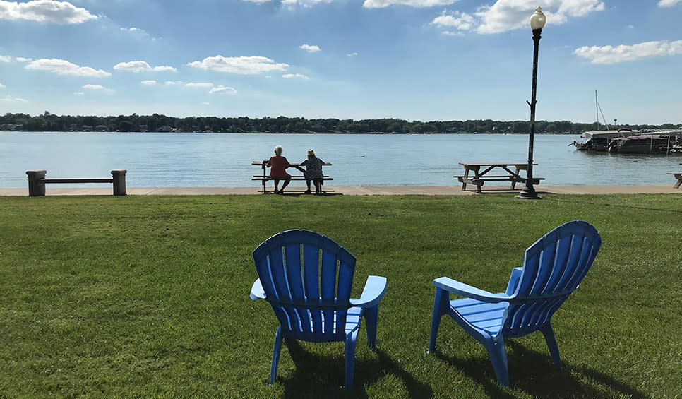Cedar Lake picnic tables by the lake