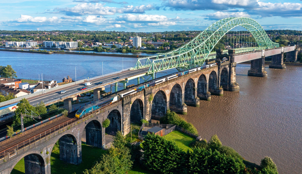 An Avanti West Coast train going under the Runcorn Bridge