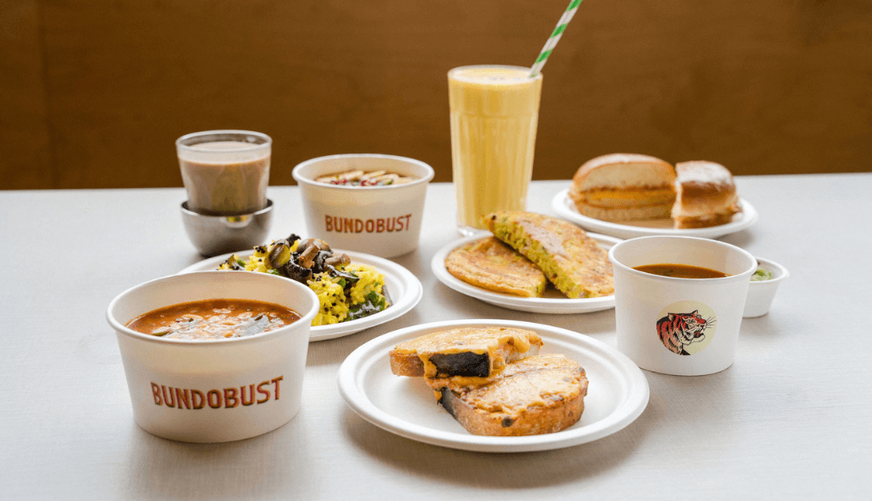 A table with a selection of food from Bundobust with Indian street food dishes.