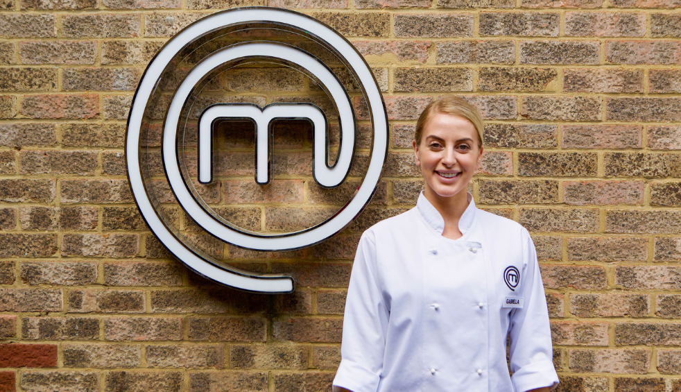 Gabriella Margiotti stands wearing Masterchef chef whites
