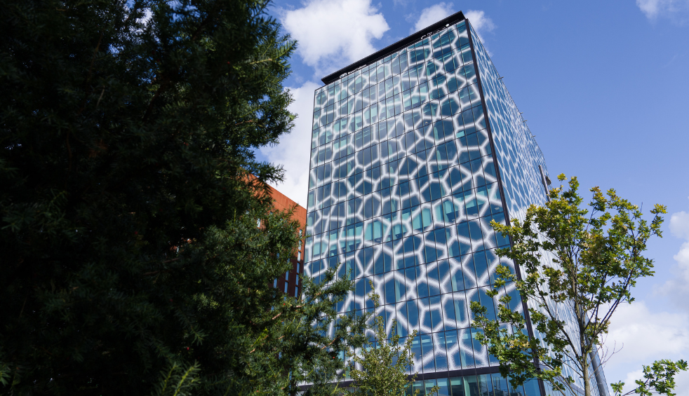 The exterior of Spaces at The Spine building with giraffe style design on the front.