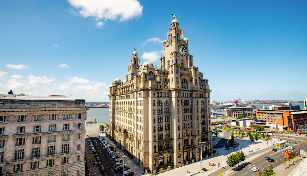 The Royal Liver Building in Liverpool with a blue sky in the background.