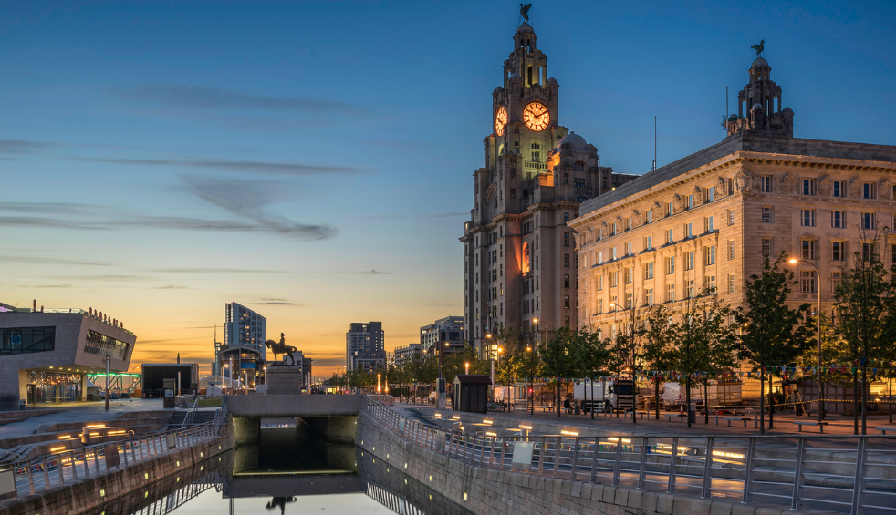 A view of the Pier Head, The Liver Building and Cunard Building as the sunsets.