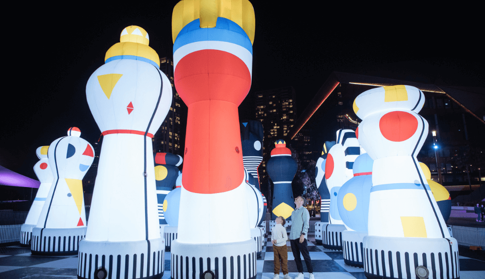 Large inflatable chess pieces as an art sculpture.